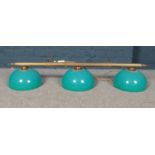 A modern brass ceiling snooker/pool table down light. Three lights and 3 turquoise green plastic