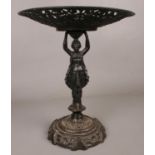 A cast iron 'Lady Tessa' centrepiece. Decorated in a classical style. H: 34cm, W: 29cm. Condition