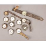 A collection of vintage watches and watch heads. Includes trench style examples.