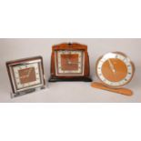 Three 8 day mantel clocks. Including Smiths, etc.