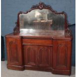 A large Victorian carved mahogany mirror back sideboard. (176cm x 170cm x 58cm)