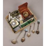 A box of collectables. Includes Victorian silver half hunter pocket watch, field compass/level,