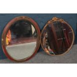 Two gilt framed wall mirrors. Including bevel edged oval example, etc.