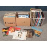 Three boxes of LP records. Includes pop, classical, jazz etc.