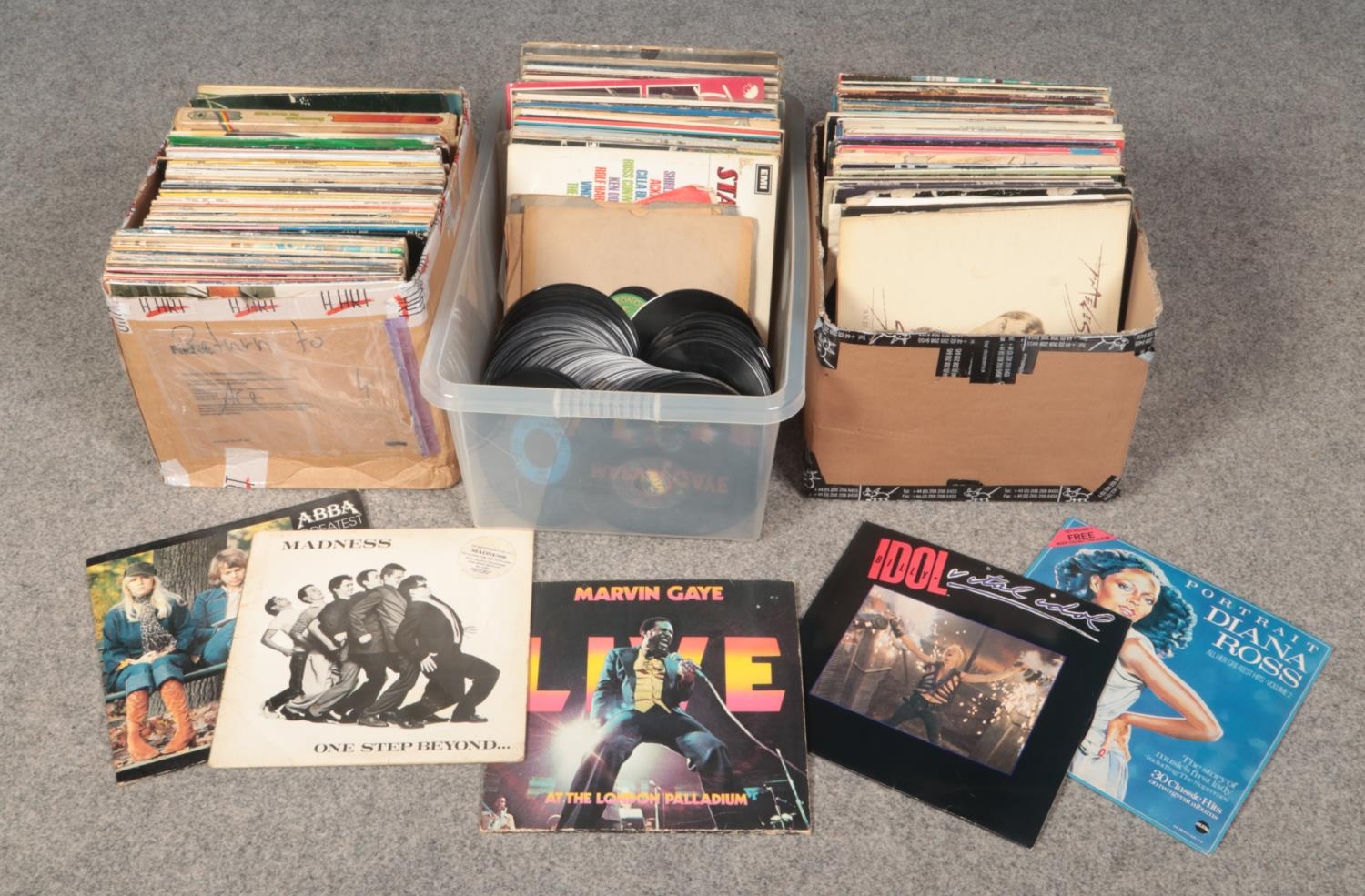 A box of mainly LP records. Also includes pop singles, not in sleeves.