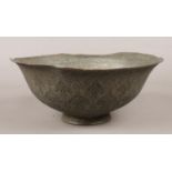 An Eastern white metal bowl. (Diameter 27cm).