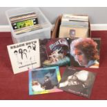Two boxes of vinyl LP records. Elton John, Barry White, Beach Boys, Meat Loaf, Bob Dylan examples