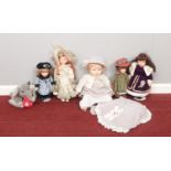 A selection of five bisque dolls - comprising of Leonardo Collection dolls as examples and a soft