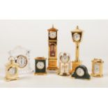 A collection of mainly Wellington miniature quartz clocks.