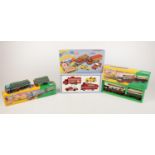 A selection of three Corgi die cast trucks & vans - comprising of two trucks from the Showman