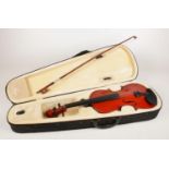 A modern violin in case.