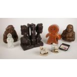 A group of miscellaneous. Pair of carved African bookends, ceramic biscuit jar, examples etc