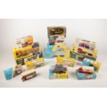 A collection of sixteen boxed Corgi classic die cast vehicles - comprising of trucks & buses. To