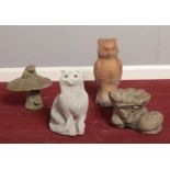 Four concrete garden ornaments. Cat, Owl, Toadstool, Boot.