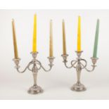 A pair of silverplate candelabra.