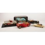 A group of die cast vehicles. Burago Jaguar SS 100 1/18, Burago Mercedes Benz Roadster 1/20,