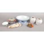 An assorted group of Oriental Collectables. To include: Blue and White Raised Bowl, a pair of