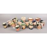 Fifteen small Royal Doulton character jugs.