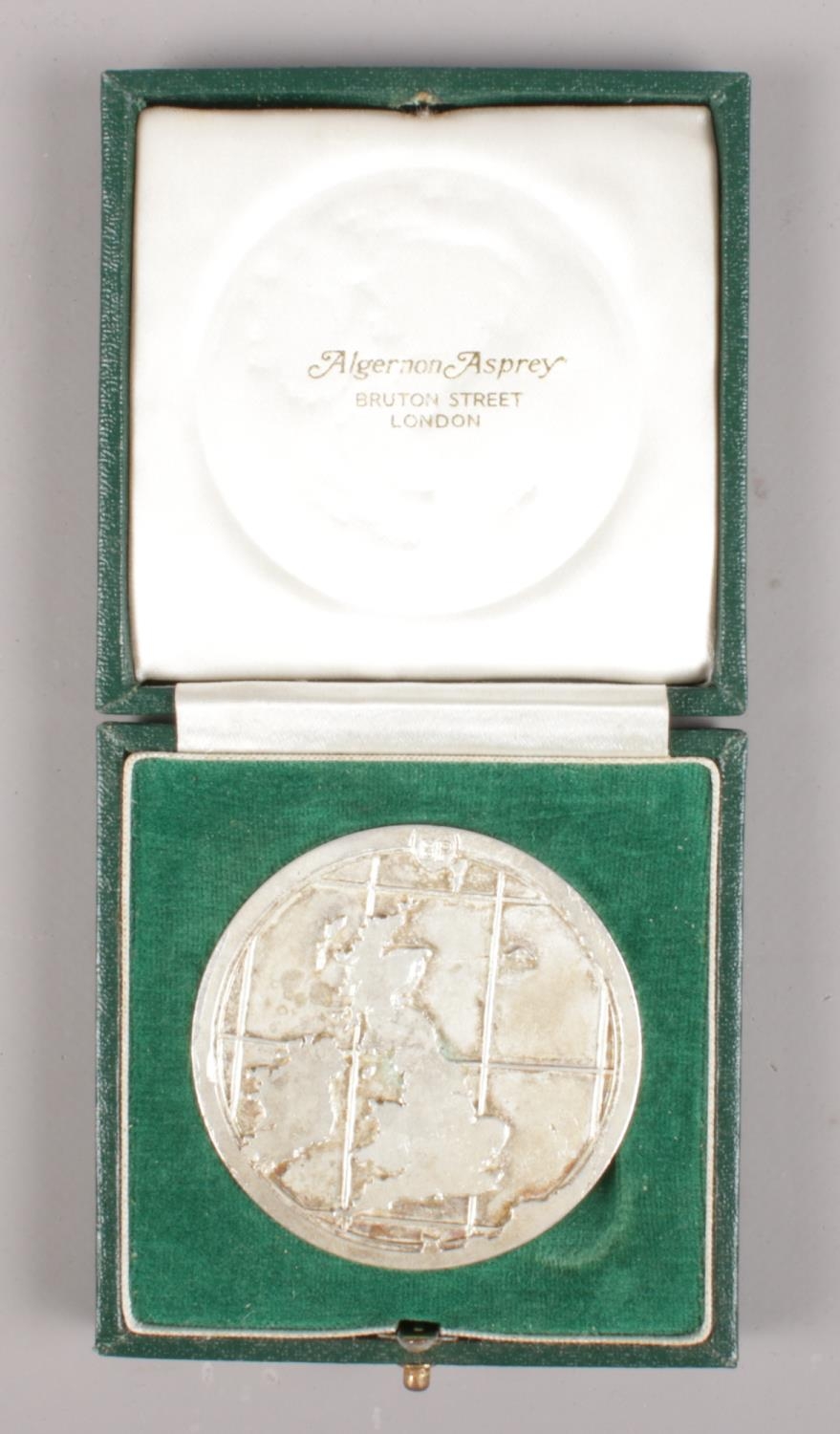 A BP white metal Forties Field inauguration medal in Algernon Asprey case.