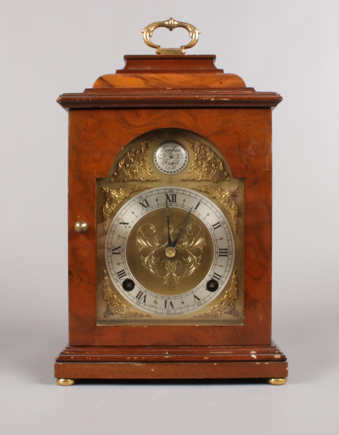 A Tempus Fugit Rosewood mantle clock. with Elliott London movement (with key) (30cm height)