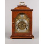 A Tempus Fugit Rosewood mantle clock. with Elliott London movement (with key) (30cm height)