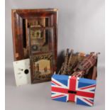 An American drop dial wall clock together with a boxed lot comprising turned and carved wooden spare