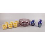 A collection of coloured glass - comprising of two 'Caithness' cobalt blue and silver vases, six