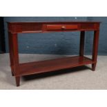 A Mahogany console table with central drawer. Made by (Theseira). H:71.5cm, W:120cm, Condition good.