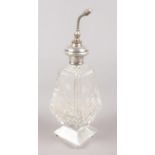 A cut glass atomiser with sterling silver top. (Height 20cm). Nibbles to glass. Dent to silver.