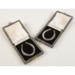 Two George V silver horseshoes. Both individually cased. Assayed Sheffield 1935 by Francis Howard