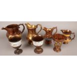 A quantity of copper lustre. Including goblets, jugs, etc.