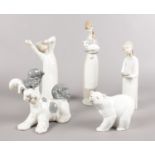 Five Lladro figures. Polar Bear, dog, girl walking with candlestick examples etc. (28cm tallest)