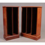 Two yew wood CD racks.