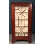 A large Victorian mahogany astragal glazed corner cupboard. (Height 199cm Width 100cm Depth 59cm).