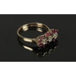 A 9 karat Gold Diamond and Garnet Ring (Size P) Gross Weight: 2.72g Diamond Sizes 1/64. Condition