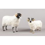 Two Beswick Figures. A Swaledale Ewe limited edition 354/1000 (certificate & original box) & Ram.