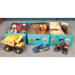 Three boxes of children's toy vehicles. Tonka example etc.