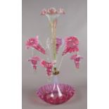 A Victorian cranberry and Vaseline glass five branch epergne. 60cm high Good condition.