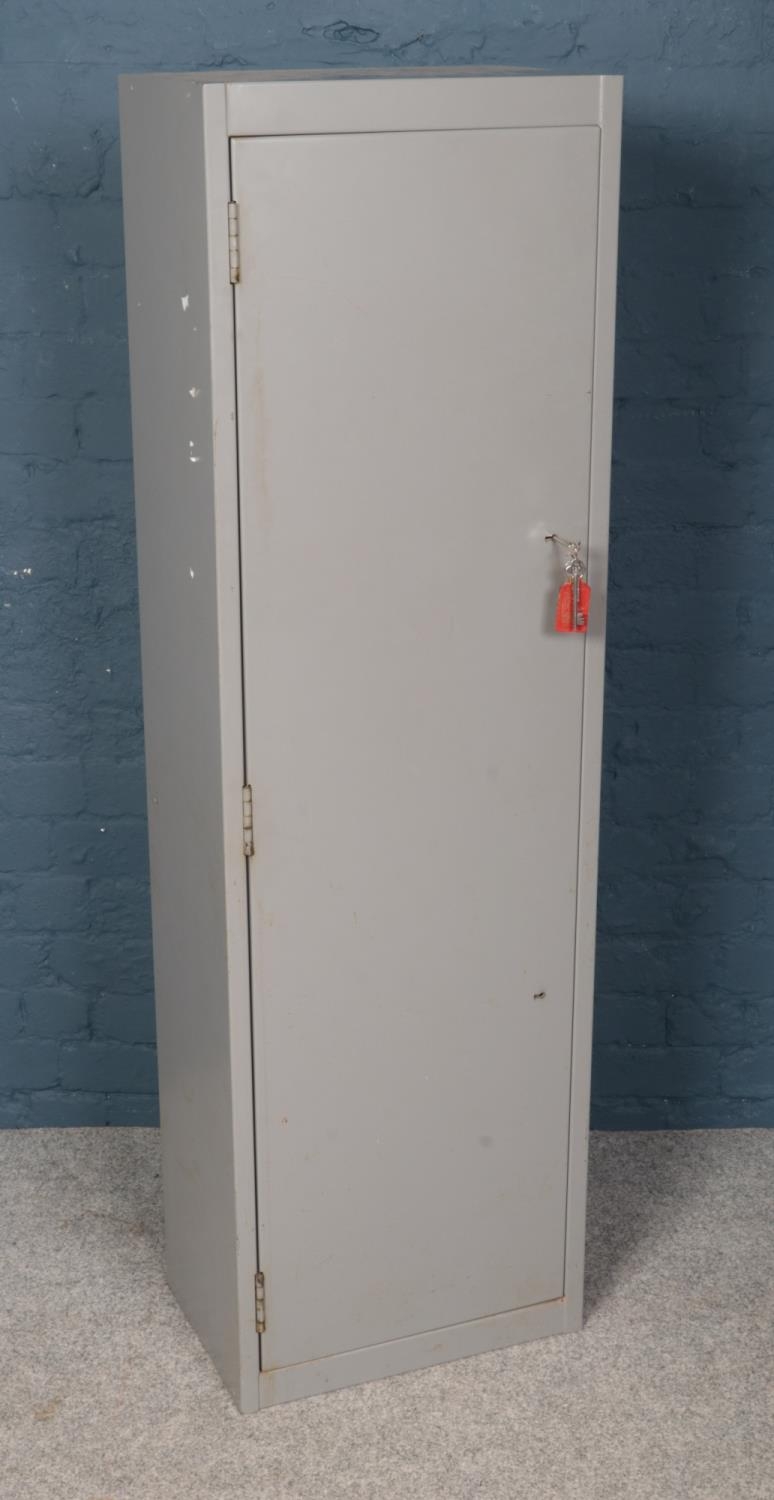 A grey steel gun cabinet. Dual locking with interior lockable compartment. (Height 153cm, Width