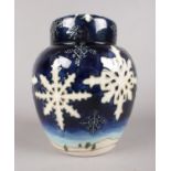 A Moorcroft 'Winter Wonderland' ginger jar and cover dated 2002 designed by Anji Davenport, artist