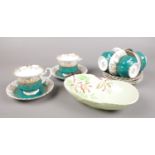 A Royal Albert Regal Series bone china part tea set, along with a Carltonware dish. Damage to one