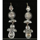 A pair of antique white metal and diamond drop earrings.