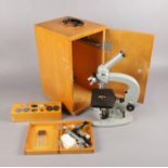 A boxer Russian microscope and associated items