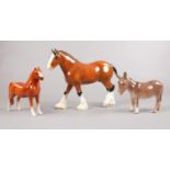 A group of Beswick figures. Brown Shire Horse (18cm height), Brown Welsh Mountain Pony (8cm height),