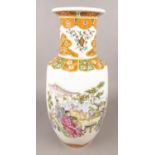 A large ceramic decorative vase. Decorated with figures and flowers. (46cm tall)