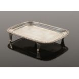 An Edwardian silver card tray. Assayed Sheffield 1903 by Thomas Bradbury & Sons Ltd.