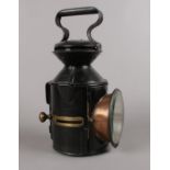 A Railway 3 aspect sliding knobs handlamp. (33cm height) The wording on this item is very