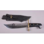 A Case XX 200th anniversary bowie knife. In leather sheath. (Total length 36cm).