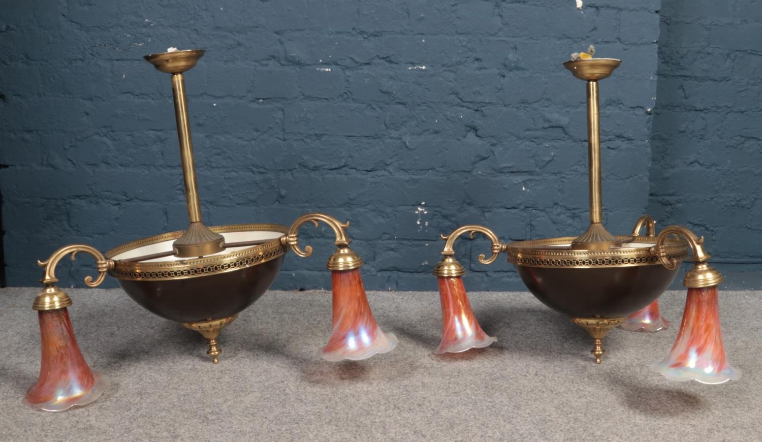 A pair of three armed brass ceiling lights - decorated with glass opalized deep pink shades. H: