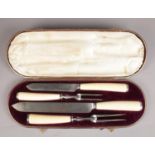 A cased Victorian Joseph Rodgers & Sons carving set. With silver collar assayed 1883 and bone